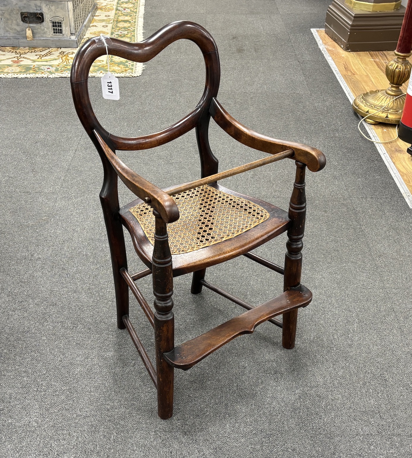 A Victorian mahogany child's chair with caned seat, width 71cm